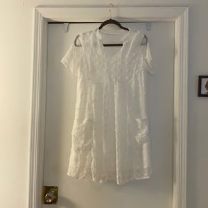 White dress with polka dot details